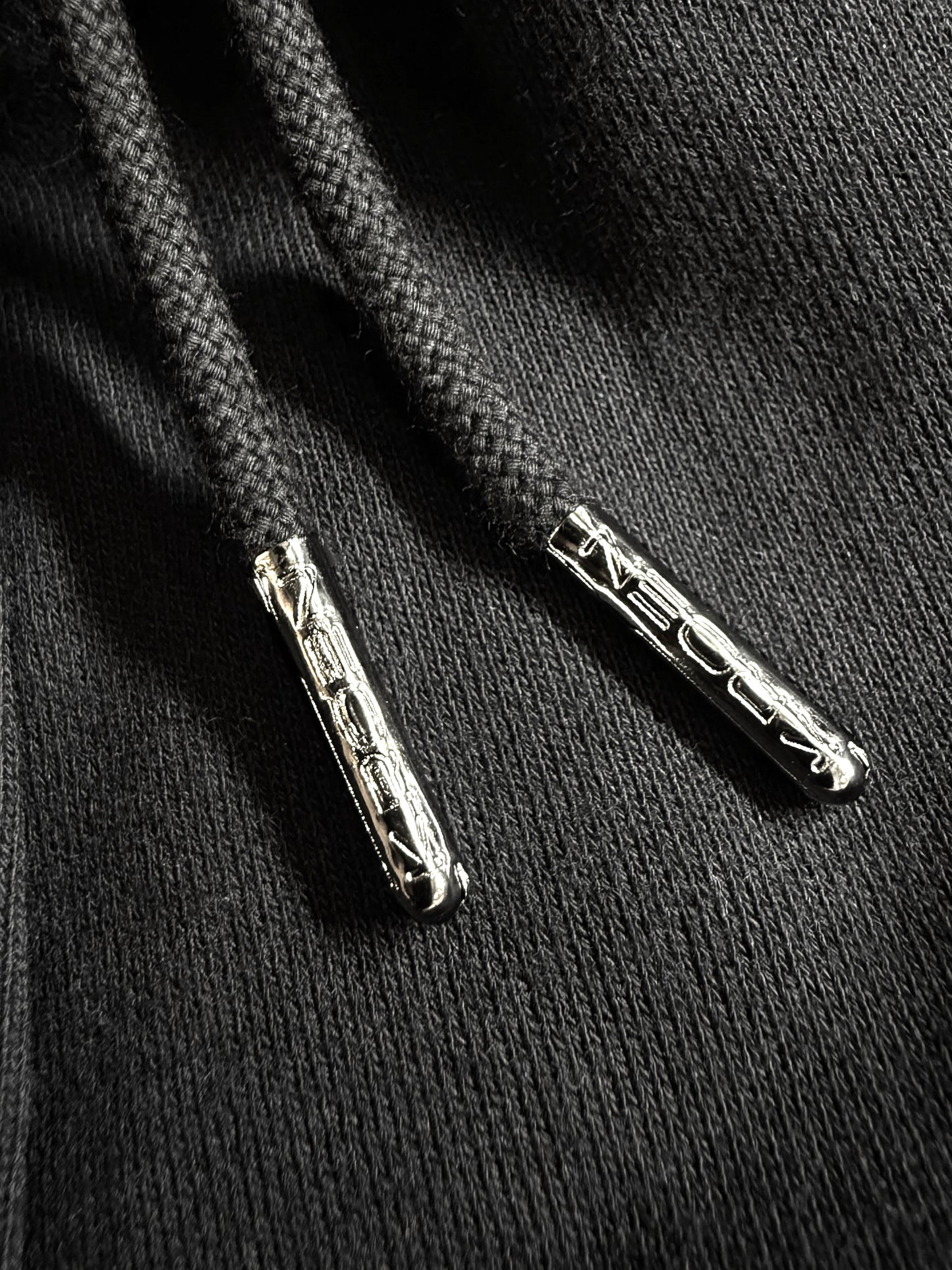 BLACK OVERLOCK SHORTS