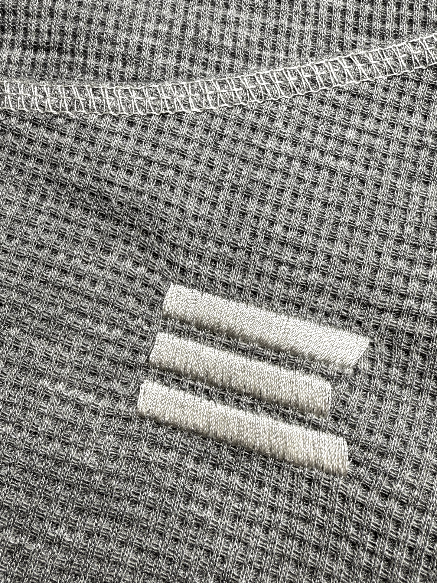 HEATHERED OVERLOCK WAFFLE