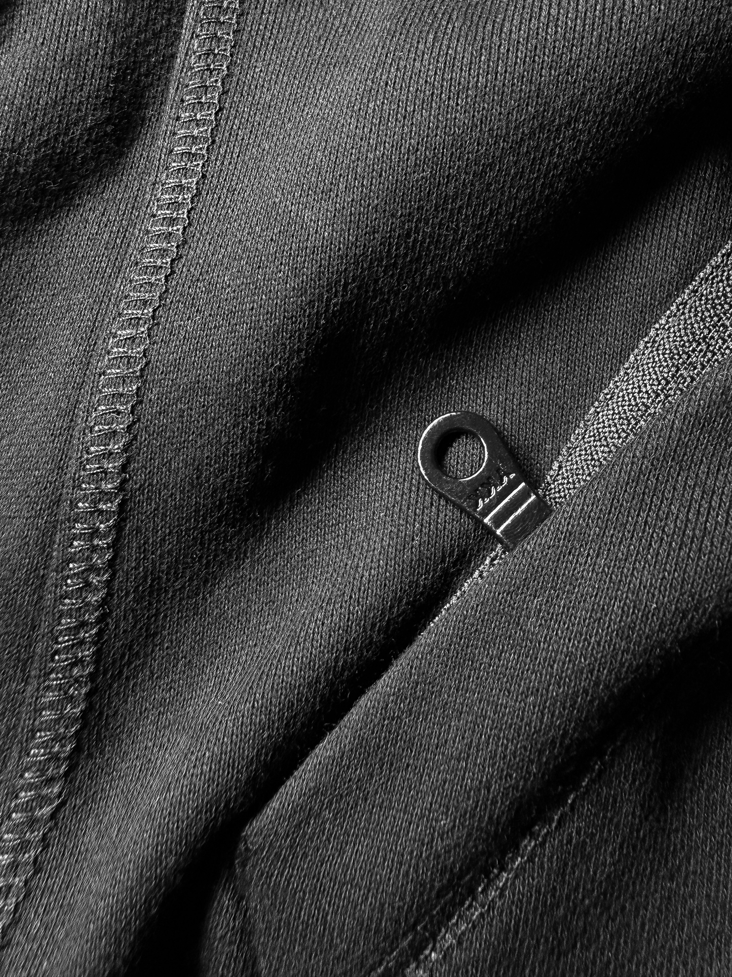 BLACK OVERLOCK HOODIE