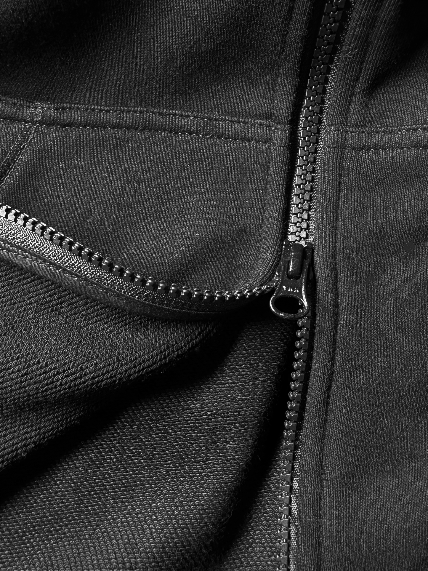 BLACK OVERLOCK HOODIE